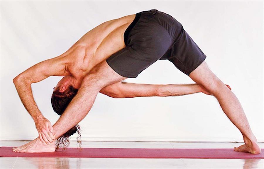 Noah Mckenna Yoga Teacher Parivrita Trikonasana 2